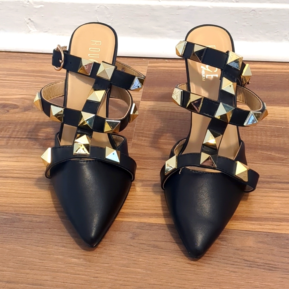 Black and gold heels